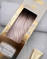 Deluxe Line Verpackung der Tape-in Extensions in Schwarz & Silberblond – Rubin Extensions®