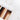 Farbring in der Hand gehalten zur Farbbestimmung vor dem Extensions-Kauf – Rubin Extensions®