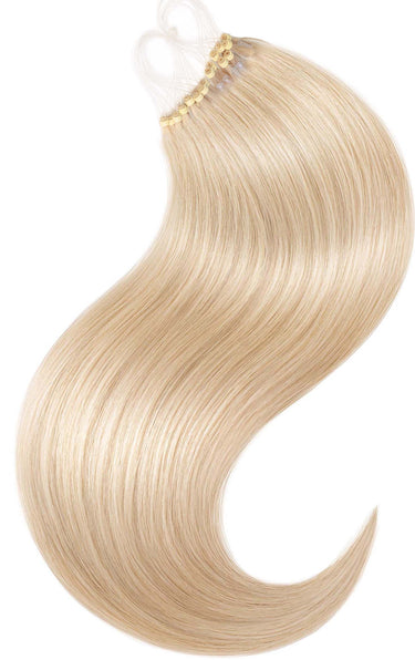 Rückenansicht einer Kundin zeigt die volle Haarlänge der Pro Deluxe Microrings in Honigblond – Rubin Extensions®