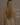 Model im Sonnenlicht mit Excellence Line Tape-In Extensions in Natural Schwarz-Braun – Rubin Extensions®