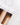 Farbring in der Hand gehalten zur Farbbestimmung vor dem Extensions-Kauf – Rubin Extensions®