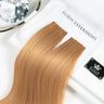 Elegante Verpackung der Keratin Bondings Haarsträhnen in Hellbraun-Karamell, Premium Line – Rubin Extensions®