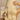 Model im Sonnenlicht mit Clip-In Extensions im Farbton Shadowed Blonde – Rubin Extensions®