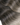 Nahaufnahme der Clip-in Tressen in Schwarz & Silberblond – Rubin Extensions®